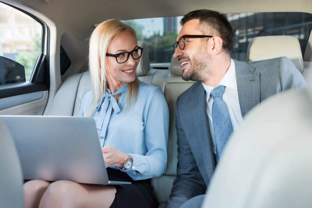 portrait-of-smiling-business-people-with-laptop-on-2024-11-12-18-51-19-utc-1024x683